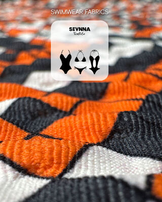 UPF 50+ সান প্রোটেকশন এবং 95% রিসাইকেলড নাইলন সহ উচ্চ কালার ফাস্টনেস টেক্সচার্ড সাঁতারের কাপড়