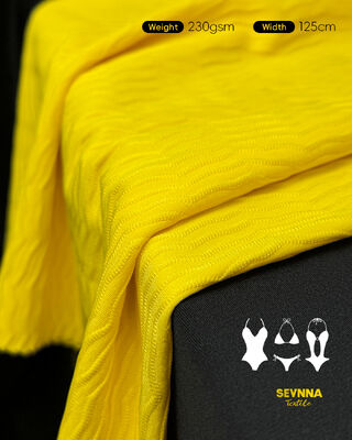 প্রিমিয়াম টেক্সচার্ড সাঁতারের পোশাকের কাপড় যাতে আছে ৮৫% পুনর্ব্যবহৃত পলিয়েস্টার + ১৫% স্প্যানডেক্স, ১২৫ সেন্টিমিটার প্রস্থ, এবং সাঁতারের পোশাকের জন্য উচ্চ স্থায়িত্ব